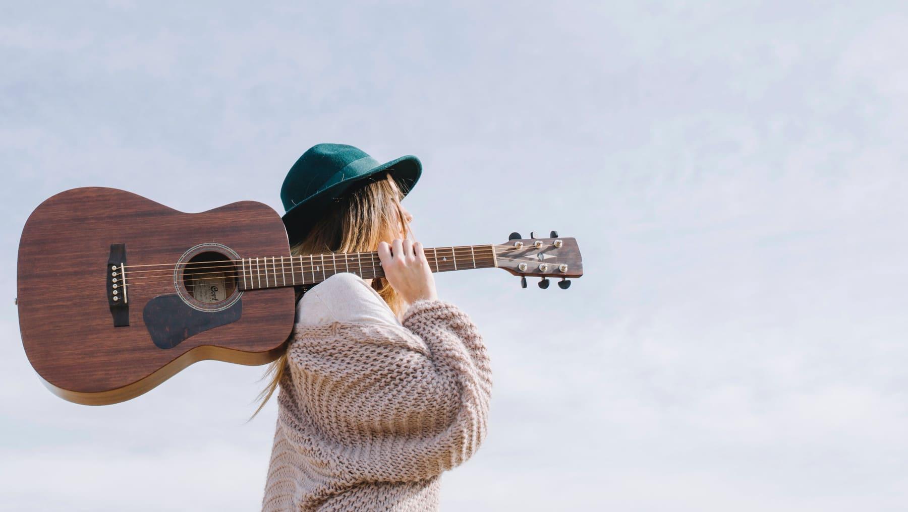 Girl playing guitar